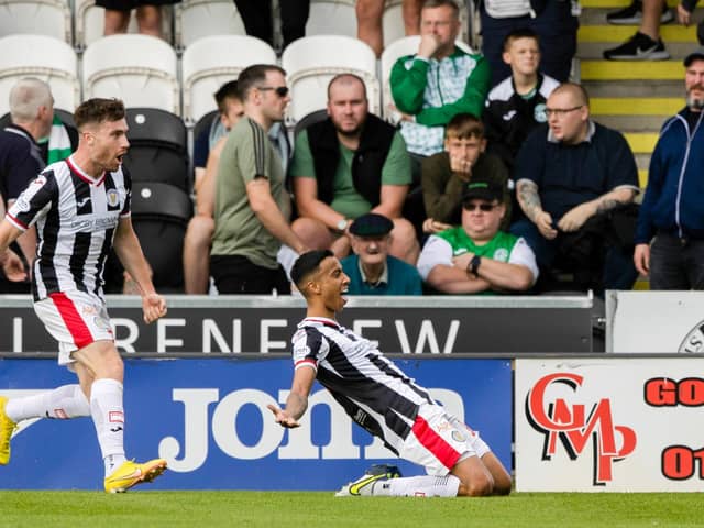 Keanu Baccus celebrates in front of the Hibs support after opening the scoring for St Mirren. Picture: SNS