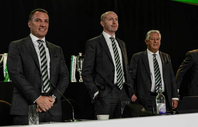 From left - Celtic manager Brendan Rodgers, chief executive Michael Nicholson and non-executive chairman Peter Lawwell (R)