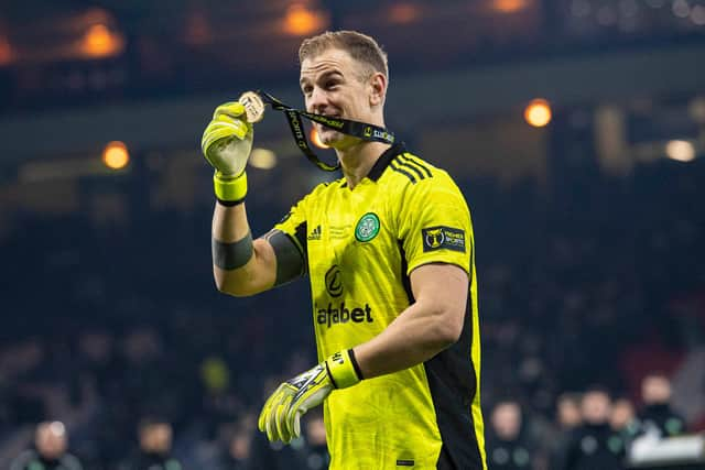 Celtic goalkeeper Joe Hart shows off his winner's medal after the Premier Sports Cup victory over Hibs.