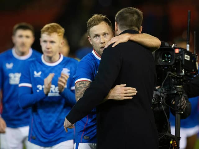 Rangers' Scott Arfield (L) and manager Michael Beale at full time after the win over Aberdeen.