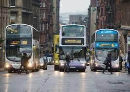 Glasgow's Hope Street is often congested with cars, taxis and buses.