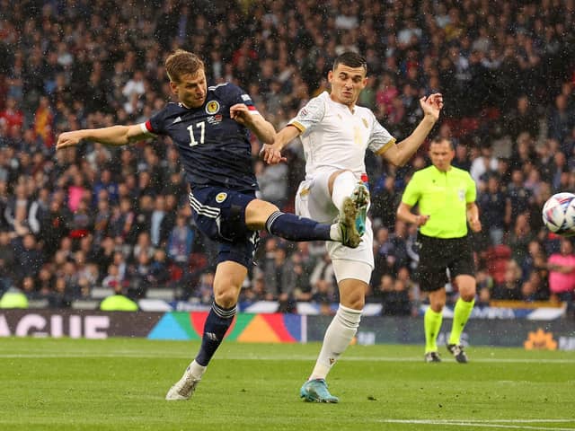 Stuart Armstrong of Scotland in action against Eduard Spertsyan of Armenia