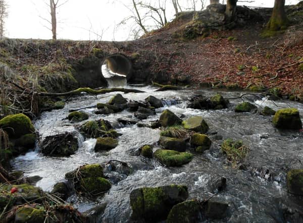 The Craigdhu Burn could present a flooding risk to the site © Copyright Richard Sutcliffe and licensed for reuse under Creative Commons Licence