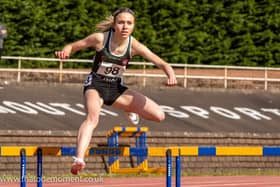 Leah Keisler on her way to winning 400m hurdles gold (Pic by Bobby Gavin)
