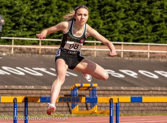 Leah Keisler on her way to winning 400m hurdles gold (Pic by Bobby Gavin)