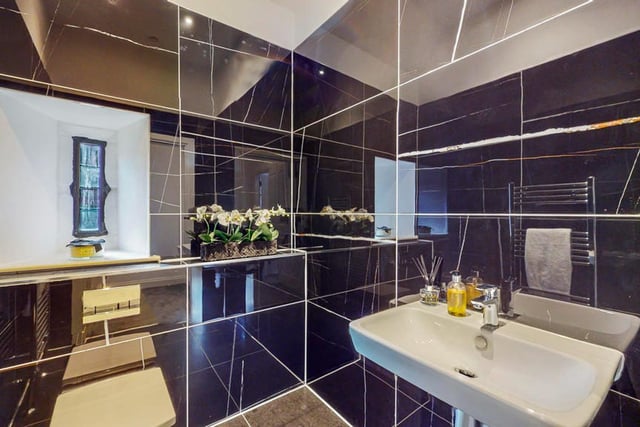 The penthouse has three bathrooms.