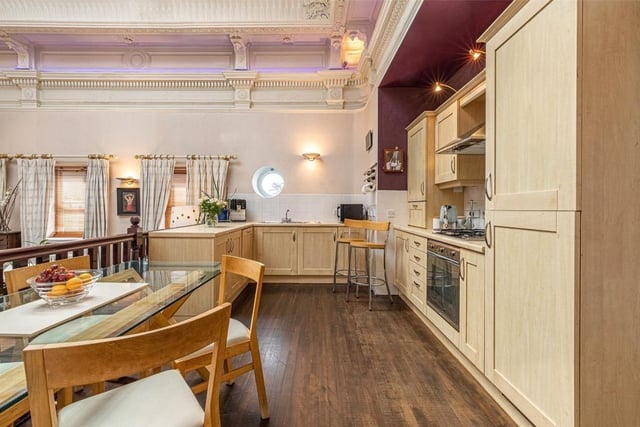 The open-plan dining room and kitchen.