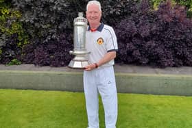 George Prosser holds Scottish Championship trophy aloft (Submitted pic)