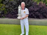 George Prosser holds Scottish Championship trophy aloft (Submitted pic)