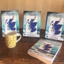 The four volumes of Harbouring A Desire, with 100% of the proceeds going to the RNLI
