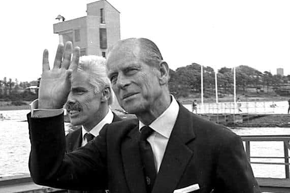 A warm wave from the Duke of Edinburgh at Commonwealth Games sailing events in Strathclyde Country Park in 1986.