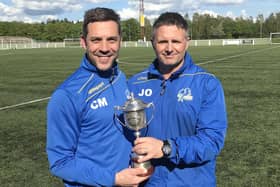 Craig McKinlay (left) and fellow Cumbernauld Colts co-manager James Orr after their League Cup win in 2018