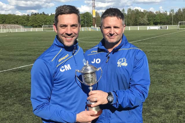 Craig McKinlay (left) and fellow Cumbernauld Colts co-manager James Orr after their League Cup win in 2018