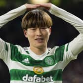 The mushroom celebration of Celtic's Kyogo Furuhashi is all his own by he shares with his fellow Japanaese players a practice for bowing to the pitch that is a mark of respect. (Photo by Ross MacDonald / SNS Group)