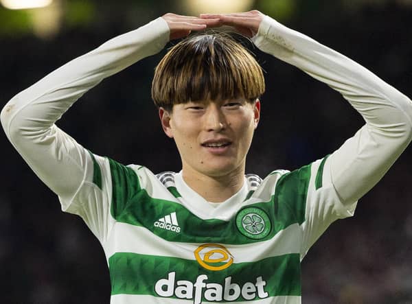 The mushroom celebration of Celtic's Kyogo Furuhashi is all his own by he shares with his fellow Japanaese players a practice for bowing to the pitch that is a mark of respect. (Photo by Ross MacDonald / SNS Group)