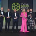 Alan Burrows (centre) has won awards for his sterling work at Motherwell FC (Pic by Stuart C. Wilson/Getty Images)