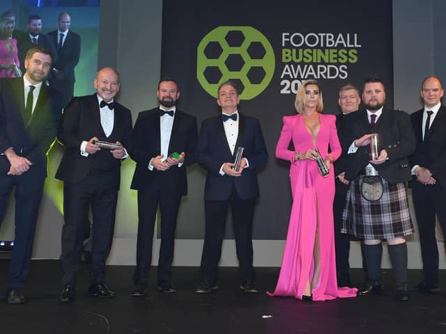 Alan Burrows (centre) has won awards for his sterling work at Motherwell FC (Pic by Stuart C. Wilson/Getty Images)