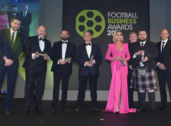 Alan Burrows (centre) has won awards for his sterling work at Motherwell FC (Pic by Stuart C. Wilson/Getty Images)