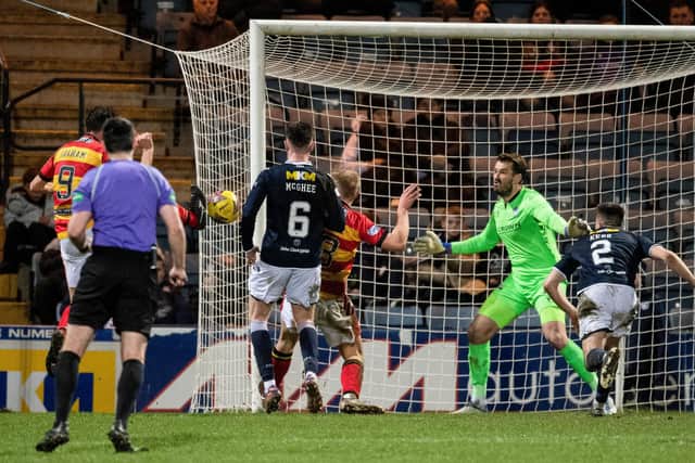Partick Thistle striker Brian Graham scored twice as the Jags downed Dundee 3-1 at Dens Park.
