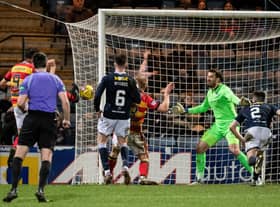 Partick Thistle striker Brian Graham scored twice as the Jags downed Dundee 3-1 at Dens Park.