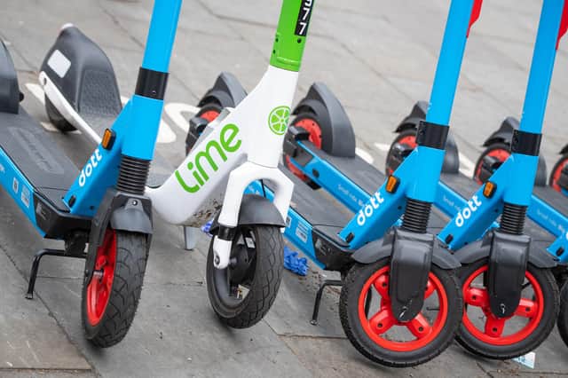 <p>General view of E-Scooters operated by Dott, Lime and Tier at an E-Scooter hire point in Kensington, west London Picture date: Tuesday June 29, 2021.</p>
