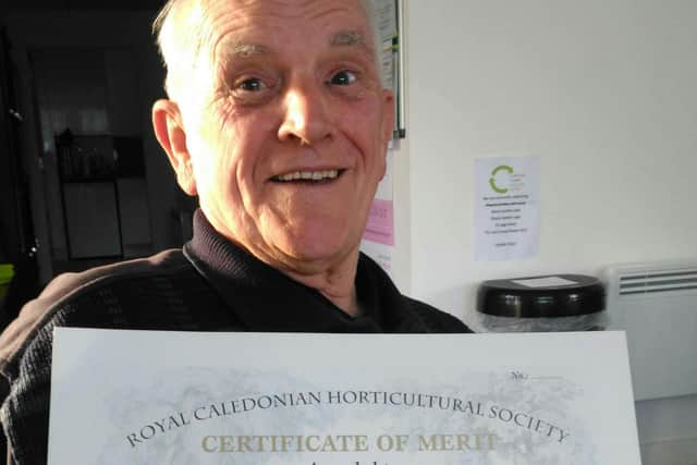 Ernest was delighted to receive his Cally certificate of merit.