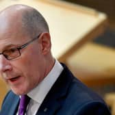Covid Scotland: Government 'actively considering' possible changes to 10 day isolation rules says John Swinney  (Photo by Jeff J Mitchell/Getty Images)
