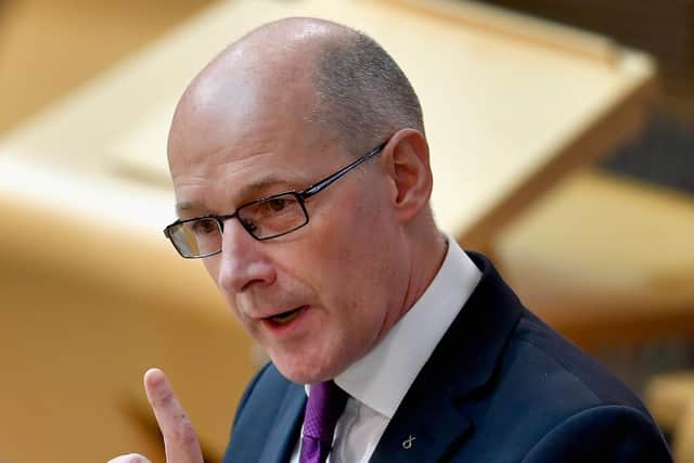 Covid Scotland: Government 'actively considering' possible changes to 10 day isolation rules says John Swinney (Photo by Jeff J Mitchell/Getty Images)