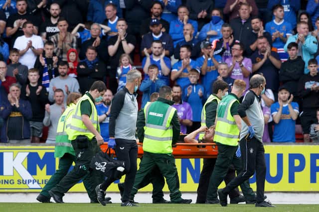 Rangers supporters watch on as Filip Helander is stretchered off during the cinch Premiership match between St Johnstone and Rangers. Picture: SNS