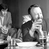 Moutaineer Don Whillans enjoys a pint in a Glasgow pub in march 1971.