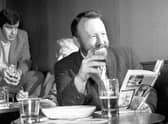 Moutaineer Don Whillans enjoys a pint in a Glasgow pub in march 1971.