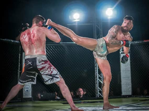 Bungard (right) in MMA action