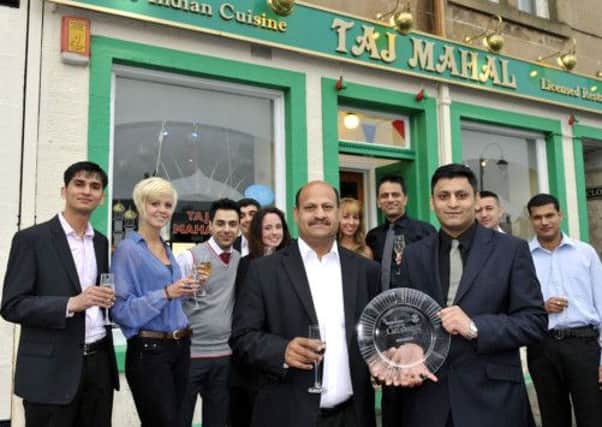 Taj Mahal restaurant winner of Team of the Year at the Scottish Curry Awards
L-R
 Mohammad Sarwar and M Abed Ullah
High Street
Biggar
21/6/12