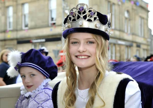 Crowning glory...Lanimer Queen Erin Snow with one of her wee page boys (Pic Lindsay Addison)