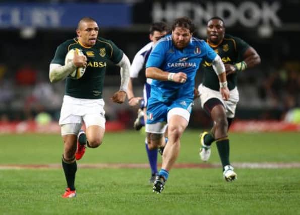 South Africa's Bryan Habana is chased by Italy's Martin Castrogiovanni in Durban last week. Picture: Getty