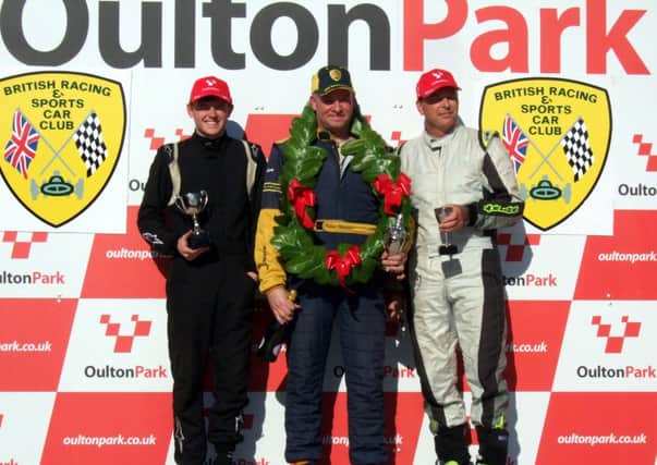 Greenfaulds sports car racer Craig Mitchell takes the second spot on the podium at Oulton Park International circuit in Cheshire.