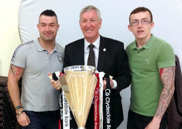 Paul & Chris Smith, Michael Currie with the SPL Trophy