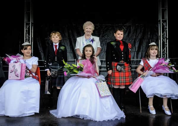 Tartan event...Tartan Queen Alex Yule, Princesses Rebecca and Bethany, Clansmen Lewis and Christopher and Chieftan Mamie Hamilton at crowning ceremony (Pic by Andrew Wilson)