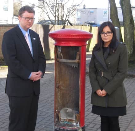 Gregg and Stephanie at vandalised postbox.