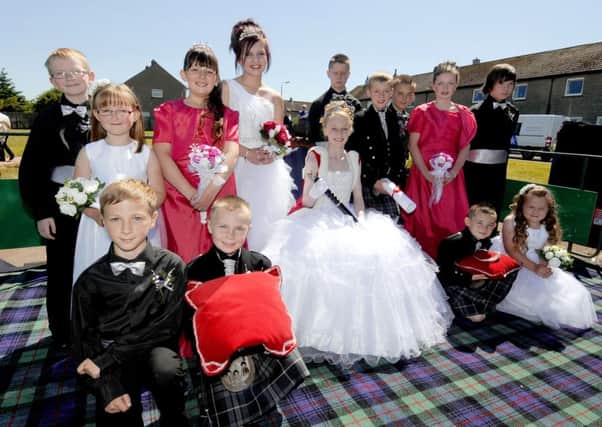 Royal occasion...for Coalburn Gala Queen Abbie Brown and her courtiers who basked in the sunshine on gala day (Pic by Alan Murray)