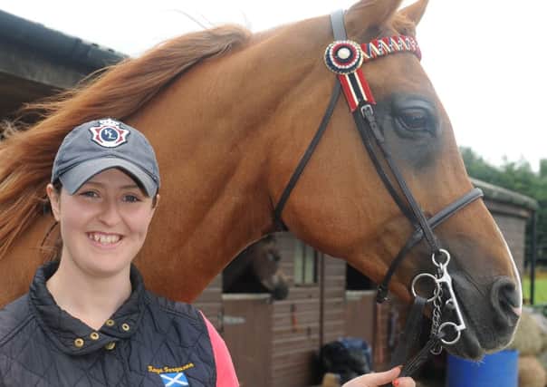 Photograph Jamie Forbes 3.8.13  KIRKINTILLOCH. Lochmill Stables. Kaye Ferguson has qualified for the horse of the year show. Kaye with her horse Nadem.