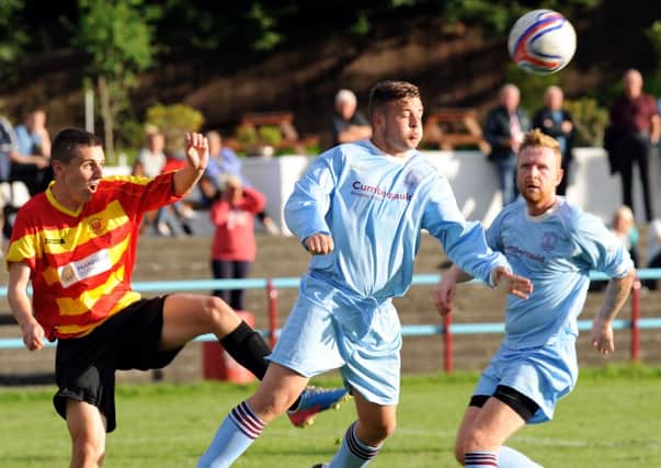 ON THE BALL: Action from Cumbernauld United's game against Rossvale.