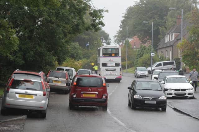 Photograph Jamie Forbes 19.9.13. LENZIE - Holy Family Primary - parking chaos outside school when parents go to pick up kids.