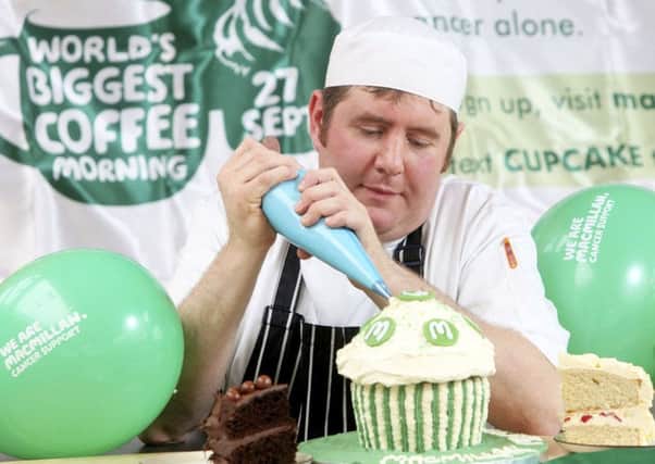 Gordon Jack/scotimage.com***Free image use***Free image use****Free image use***20/09/13 - MACMILLAN COFFEE MORNING - Dobbies baker, Graham Ayton pictured with his cakes being made for next Friday which sees the 'World's Biggest Coffee Morning taking place across the UK to raise funds for the Cancer Support Charity. In a recent poll of Britain's favourite cake the Carrot Cake came out on top with the cup cake coming last.
