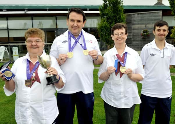 Special Olympics bowls medallists
L-R
Janet Grant (59), Andrew Harrison (44), Margo McCaulay (55) and Douglas Ritchie (29)
Lanark
27/9/13