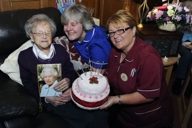 Edith Martin celebrates her 100th birthday. Edith is pictured with staff from Craig En Goyne Care Home, Lianne Leishman and Janette Richardson.