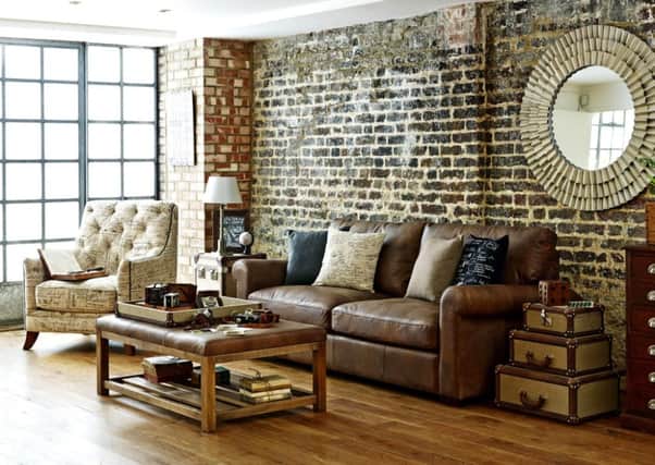 Undated Handout Photo of Linea restoration range Westminster leather sofa, £3,229; industrial trunk side table, £749; mini vintage globe, £25; Waltz armchair, £999; industrial coffee tale, £1,159, House of Fraser. See PA Feature INTERIORS Trends. Picture credit should read: PA Photo/Handout. WARNING: This picture must only be used to accompany PA Feature INTERIORS Trends.
