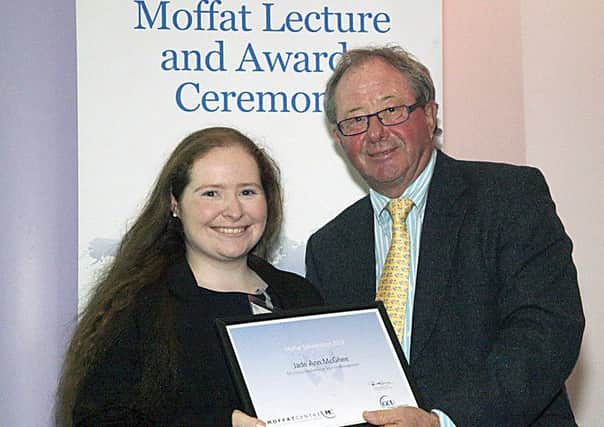 Jade Ann is seen her receiving the coveted award from Dr Jamie Moffat.