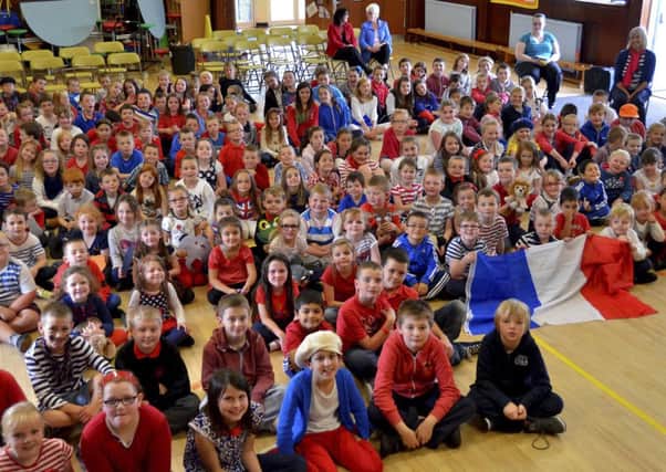 Ooh la la...the tres chic youngsters at Lanark Primary School in their red, white and blue (Pic Rodger Price)