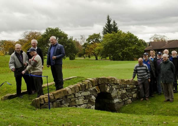 OPENING: Committee members and bridge builders gather for hte official opening of the Cavalry Bridge at Kilsyth Lennox Golf Club.